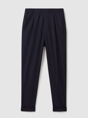 Relaxed-Fit Pleated Tapered Trousers Navy | Men