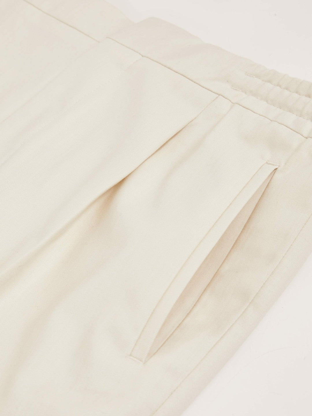 Relaxed-Fit Pleated Tapered Trousers Ecru | Men