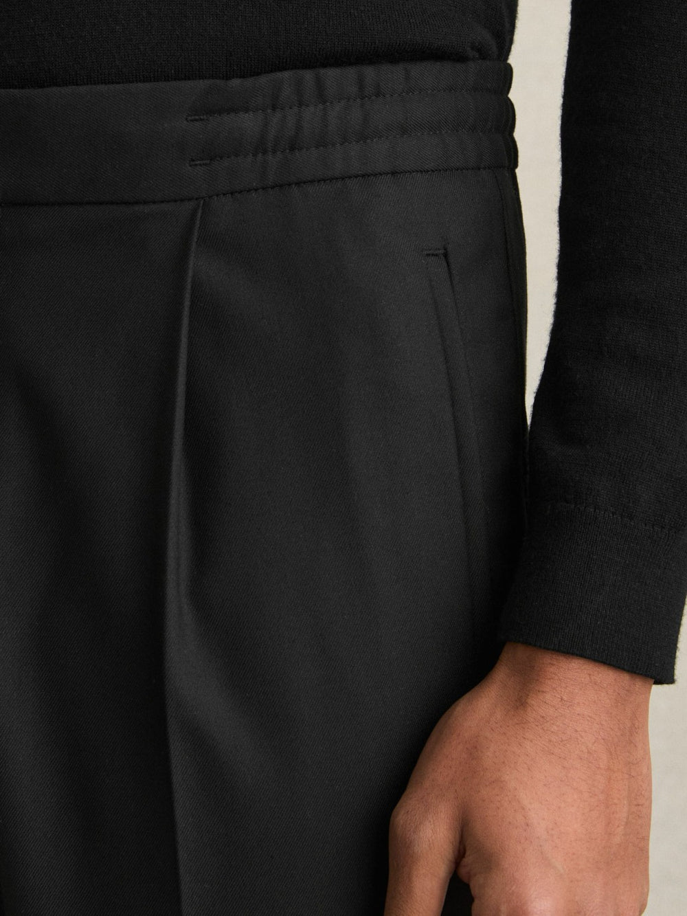 Relaxed-Fit Pleated Tapered Trousers Black | Men