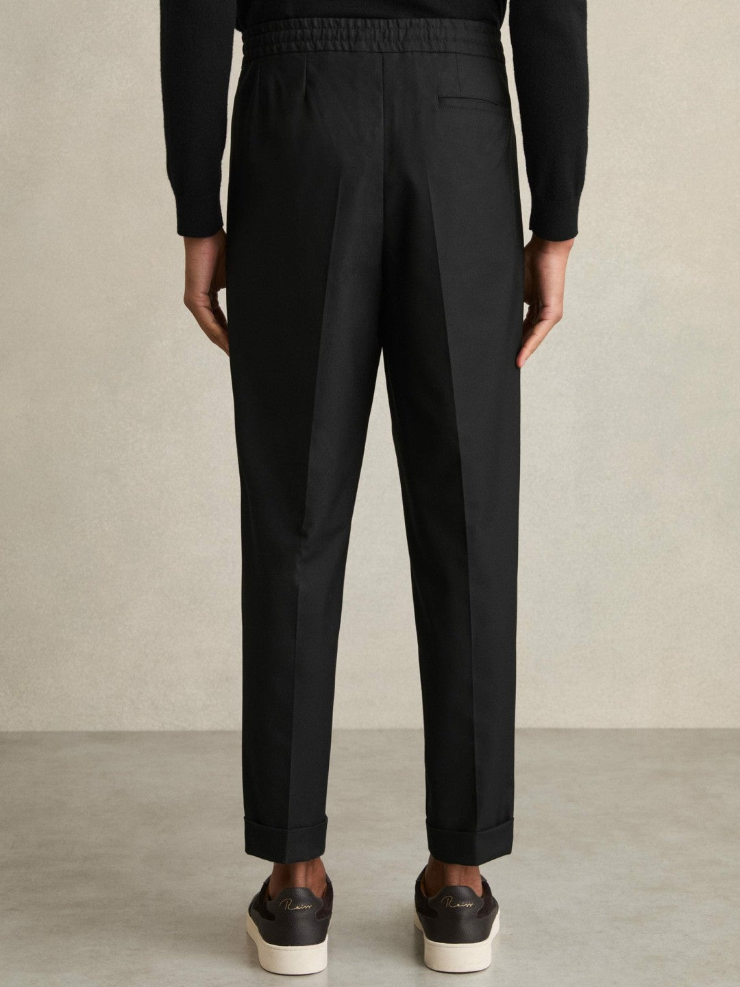 Relaxed-Fit Pleated Tapered Trousers Black | Men