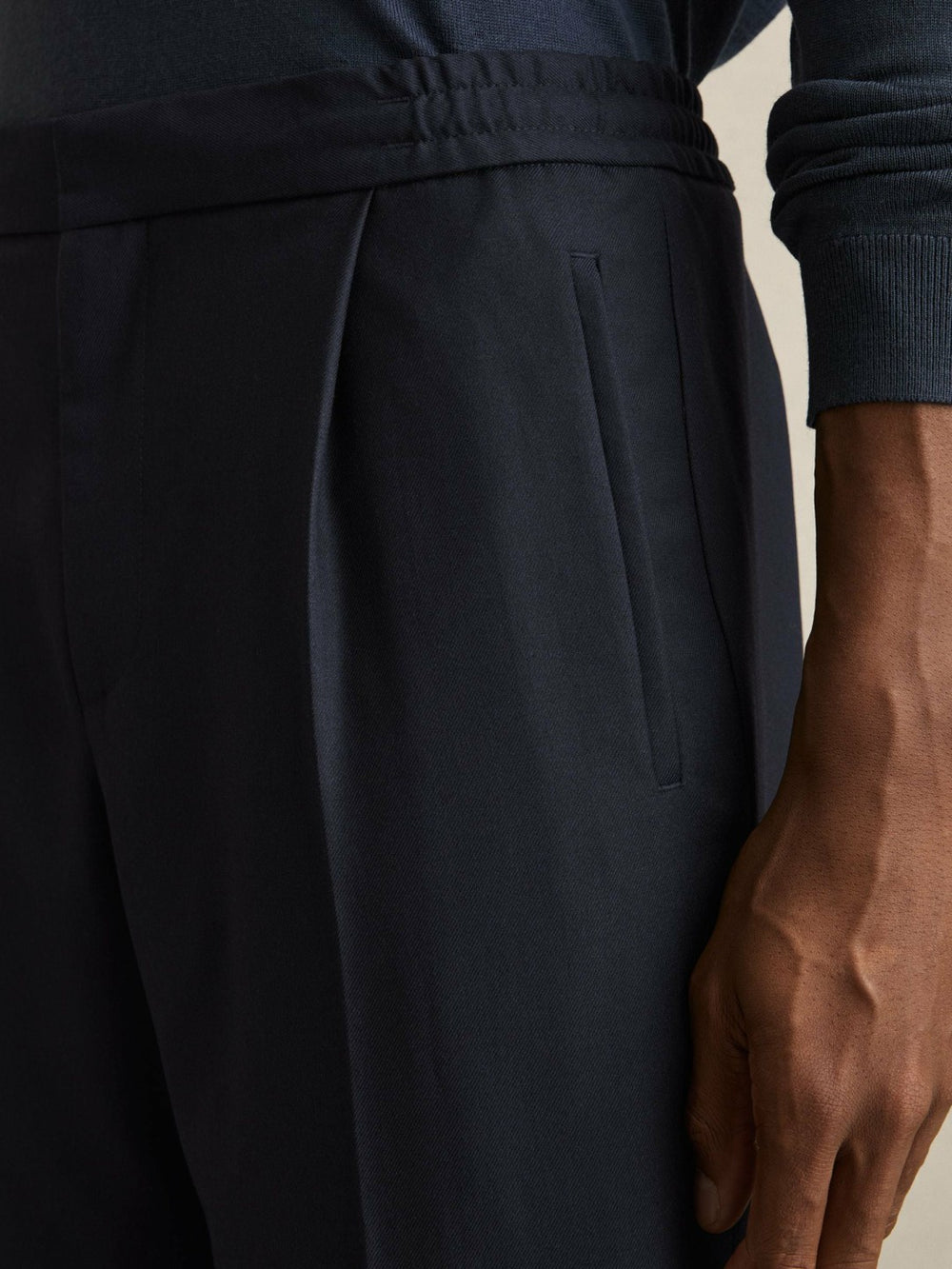 Relaxed-Fit Pleated Tapered Trousers Navy | Men