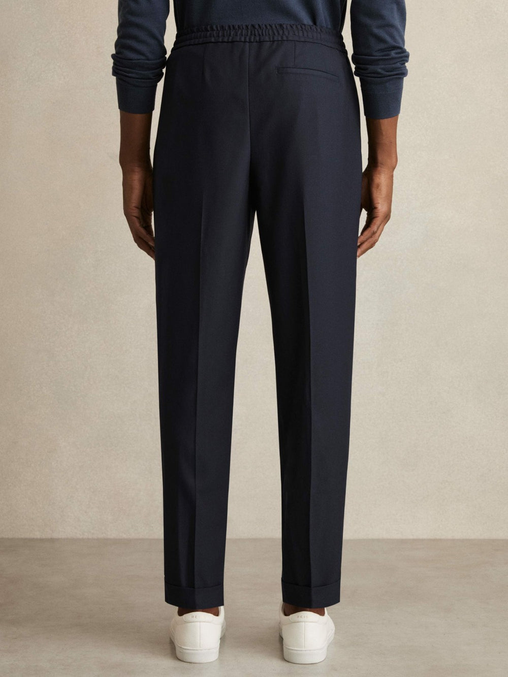 Relaxed-Fit Pleated Tapered Trousers Navy | Men